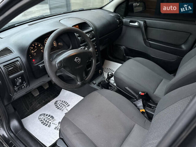 Черный Опель Астра, объемом двигателя 1.4 л и пробегом 102 тыс. км за 3600 $, фото 21 на Automoto.ua