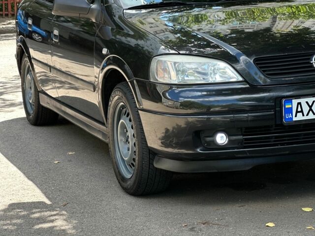 Черный Опель Астра, объемом двигателя 1.6 л и пробегом 137 тыс. км за 3700 $, фото 10 на Automoto.ua