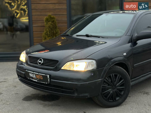 Черный Опель Астра, объемом двигателя 1.4 л и пробегом 102 тыс. км за 3600 $, фото 4 на Automoto.ua