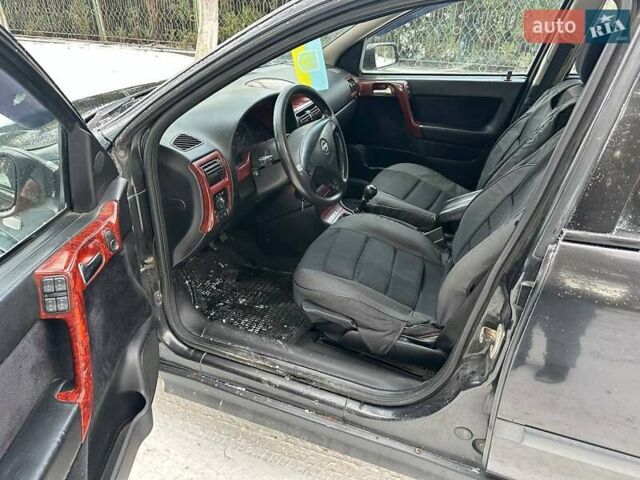 Чорний Опель Астра, об'ємом двигуна 1.36 л та пробігом 320 тис. км за 2800 $, фото 6 на Automoto.ua