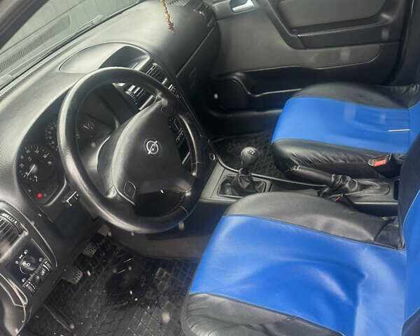 Чорний Опель Астра, об'ємом двигуна 1.6 л та пробігом 180 тис. км за 3500 $, фото 9 на Automoto.ua