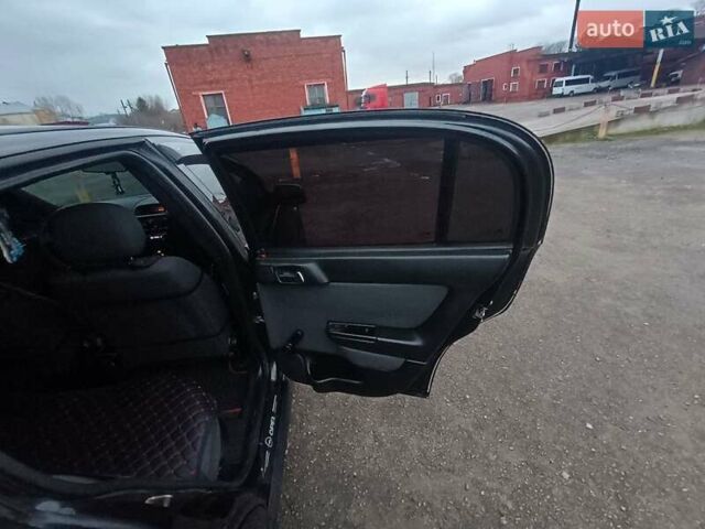 Чорний Опель Астра, об'ємом двигуна 1.4 л та пробігом 222 тис. км за 3400 $, фото 12 на Automoto.ua