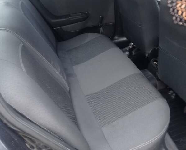 Черный Опель Астра, объемом двигателя 1.4 л и пробегом 340 тыс. км за 4100 $, фото 7 на Automoto.ua