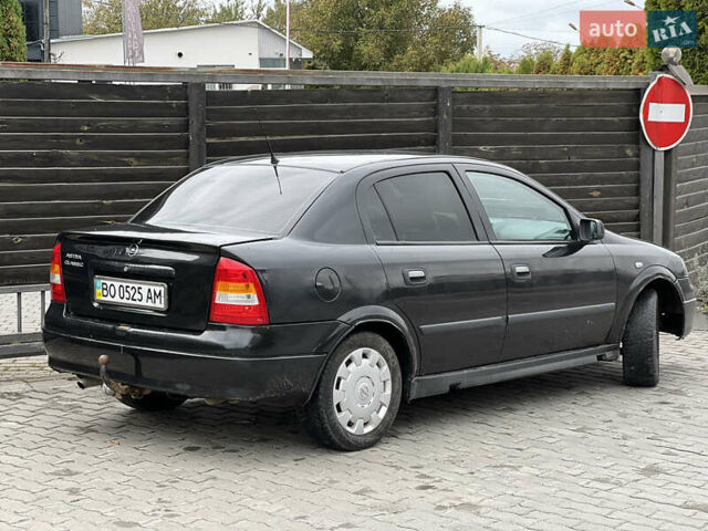 Черный Опель Астра, объемом двигателя 1.4 л и пробегом 157 тыс. км за 2500 $, фото 21 на Automoto.ua