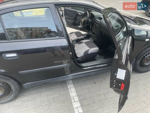 Черный Опель Астра, объемом двигателя 1.4 л и пробегом 95 тыс. км за 3500 $, фото 14 на Automoto.ua