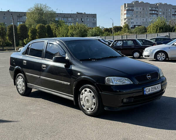Чорний Опель Астра, об'ємом двигуна 1.6 л та пробігом 176 тис. км за 4700 $, фото 2 на Automoto.ua