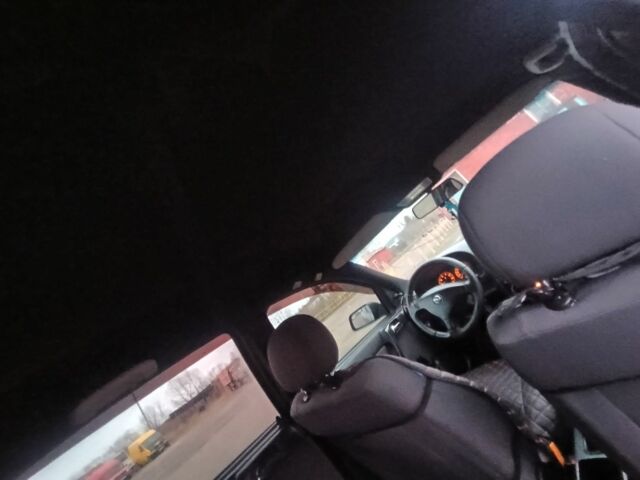 Чорний Опель Астра, об'ємом двигуна 1.4 л та пробігом 222 тис. км за 3400 $, фото 13 на Automoto.ua