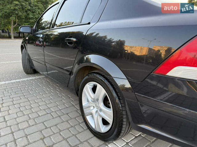 Черный Опель Астра, объемом двигателя 1.6 л и пробегом 108 тыс. км за 6200 $, фото 6 на Automoto.ua