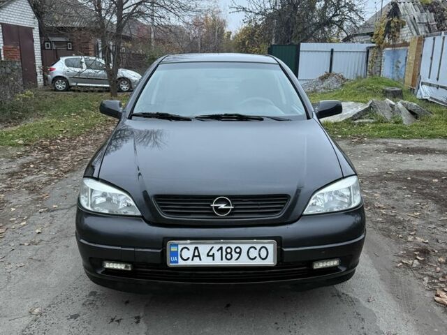 Черный Опель Астра, объемом двигателя 1.6 л и пробегом 250 тыс. км за 3750 $, фото 11 на Automoto.ua