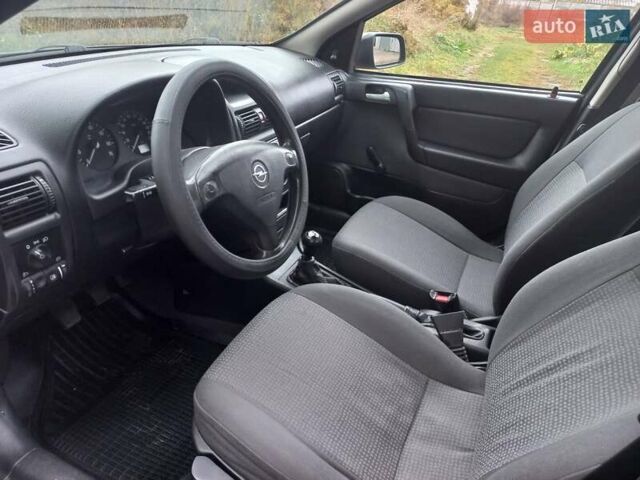 Черный Опель Астра, объемом двигателя 1.4 л и пробегом 220 тыс. км за 4500 $, фото 9 на Automoto.ua