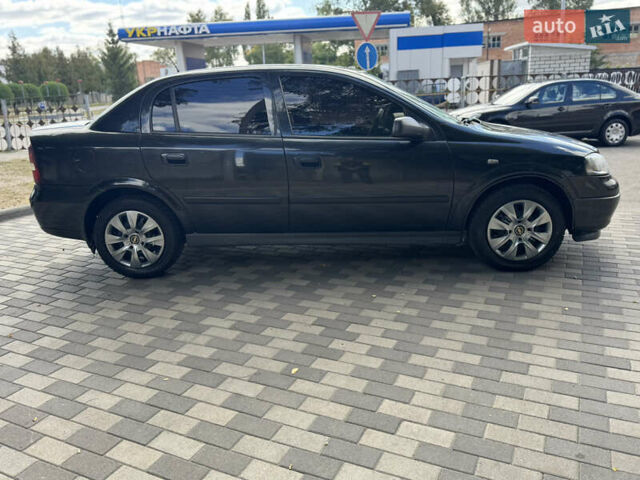 Чорний Опель Астра, об'ємом двигуна 1.36 л та пробігом 265 тис. км за 2999 $, фото 5 на Automoto.ua