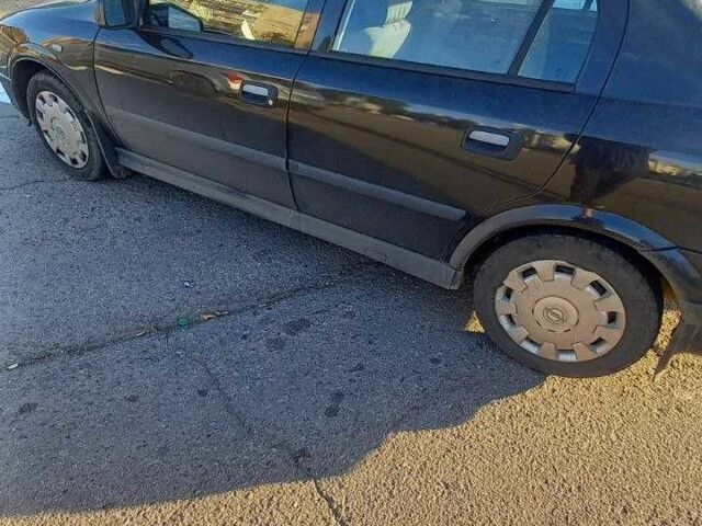Черный Опель Астра, объемом двигателя 1.4 л и пробегом 169 тыс. км за 4650 $, фото 19 на Automoto.ua