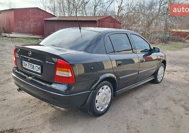 Чорний Опель Астра, об'ємом двигуна 1.6 л та пробігом 52 тис. км за 5600 $, фото 4 на Automoto.ua