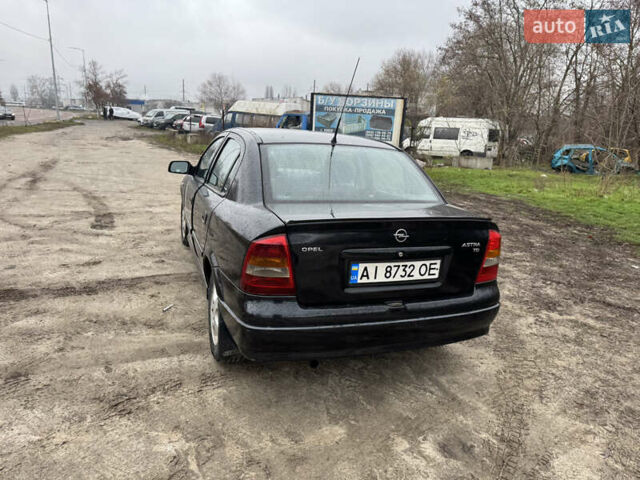 Черный Опель Астра, объемом двигателя 1.7 л и пробегом 300 тыс. км за 2999 $, фото 9 на Automoto.ua