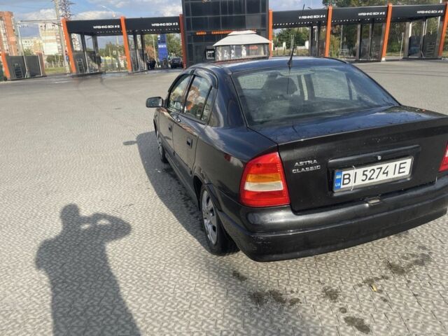 Черный Опель Астра, объемом двигателя 1.4 л и пробегом 212 тыс. км за 4000 $, фото 5 на Automoto.ua