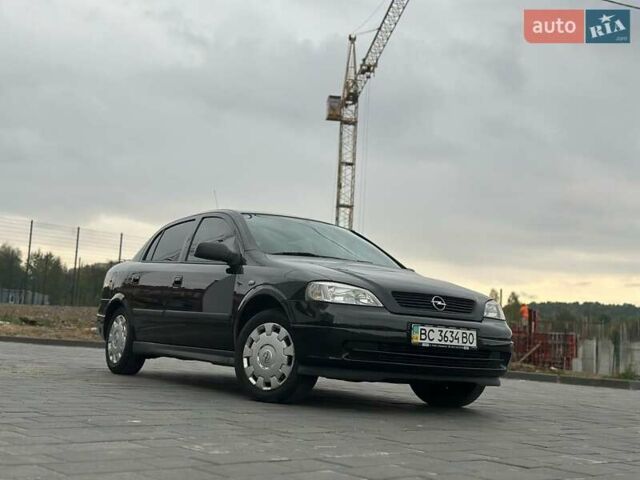 Черный Опель Астра, объемом двигателя 1.4 л и пробегом 216 тыс. км за 3999 $, фото 30 на Automoto.ua