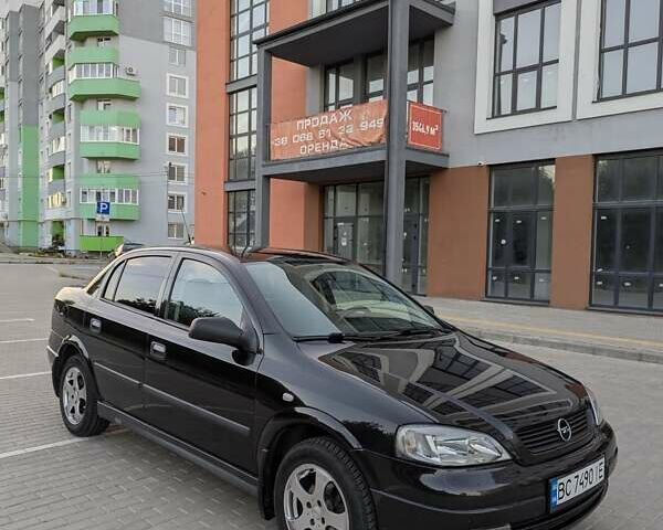 Черный Опель Астра, объемом двигателя 1.6 л и пробегом 215 тыс. км за 3900 $, фото 10 на Automoto.ua