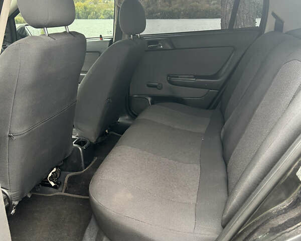 Черный Опель Астра, объемом двигателя 1.36 л и пробегом 193 тыс. км за 3700 $, фото 8 на Automoto.ua