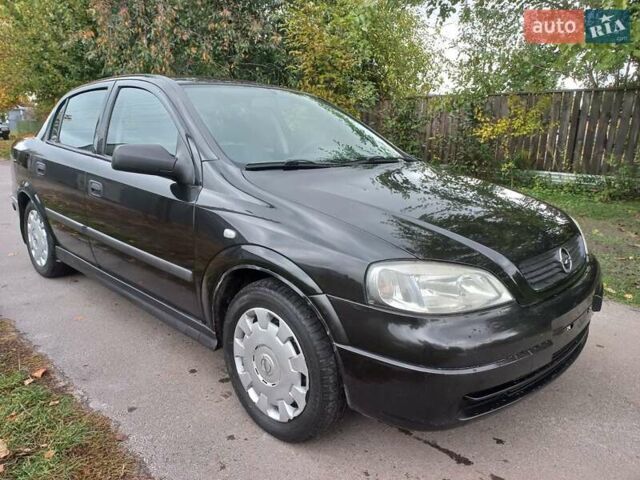 Черный Опель Астра, объемом двигателя 1.4 л и пробегом 220 тыс. км за 4500 $, фото 3 на Automoto.ua