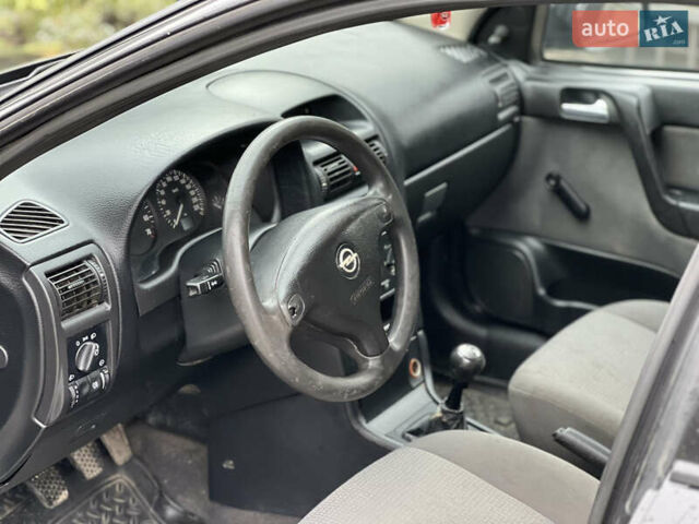 Черный Опель Астра, объемом двигателя 1.4 л и пробегом 157 тыс. км за 2500 $, фото 9 на Automoto.ua