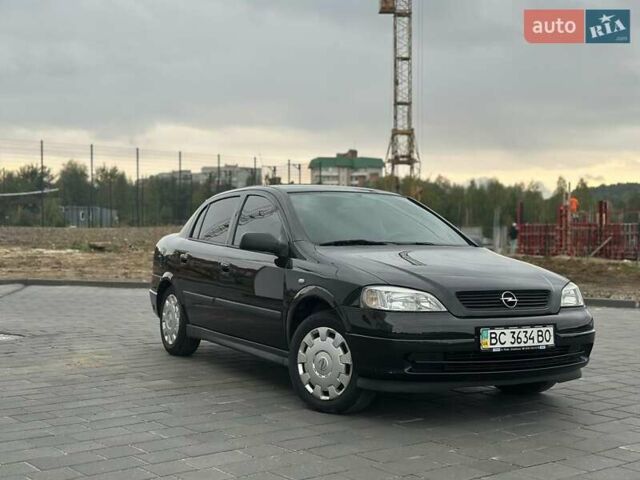 Черный Опель Астра, объемом двигателя 1.4 л и пробегом 216 тыс. км за 3999 $, фото 31 на Automoto.ua