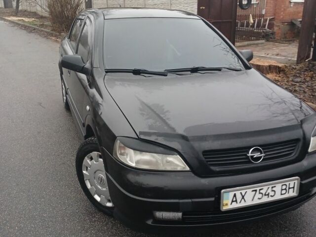 Черный Опель Астра, объемом двигателя 1.4 л и пробегом 362 тыс. км за 2600 $, фото 1 на Automoto.ua