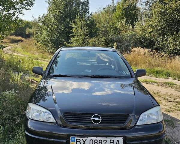 Черный Опель Астра, объемом двигателя 1.38 л и пробегом 144 тыс. км за 4600 $, фото 1 на Automoto.ua