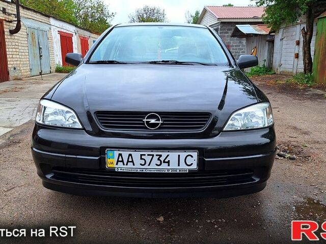 Черный Опель Астра, объемом двигателя 1.4 л и пробегом 91 тыс. км за 5100 $, фото 7 на Automoto.ua