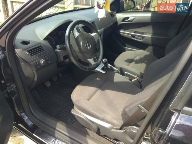 Черный Опель Астра, объемом двигателя 1.6 л и пробегом 159 тыс. км за 6000 $, фото 7 на Automoto.ua