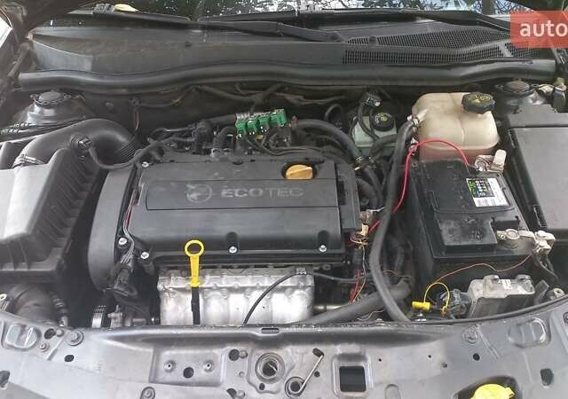 Черный Опель Астра, объемом двигателя 1.6 л и пробегом 310 тыс. км за 5000 $, фото 6 на Automoto.ua