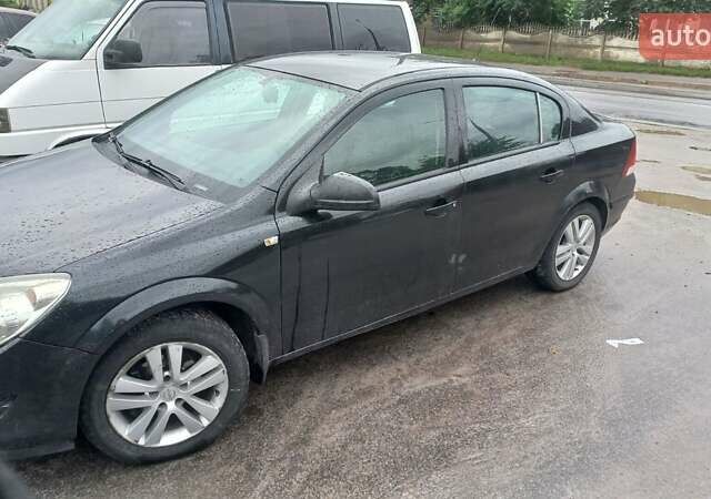 Черный Опель Астра, объемом двигателя 1.6 л и пробегом 310 тыс. км за 5000 $, фото 4 на Automoto.ua