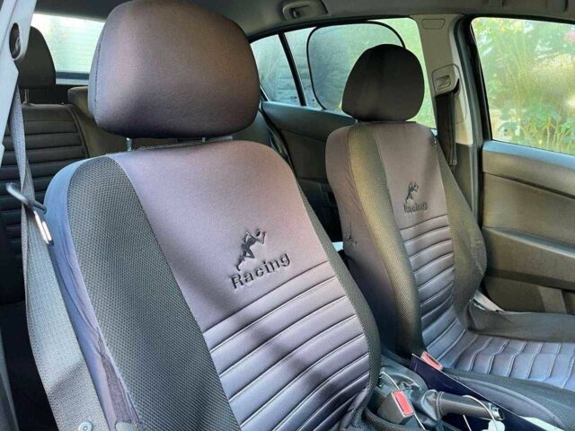Черный Опель Астра, объемом двигателя 1.6 л и пробегом 218 тыс. км за 5500 $, фото 3 на Automoto.ua