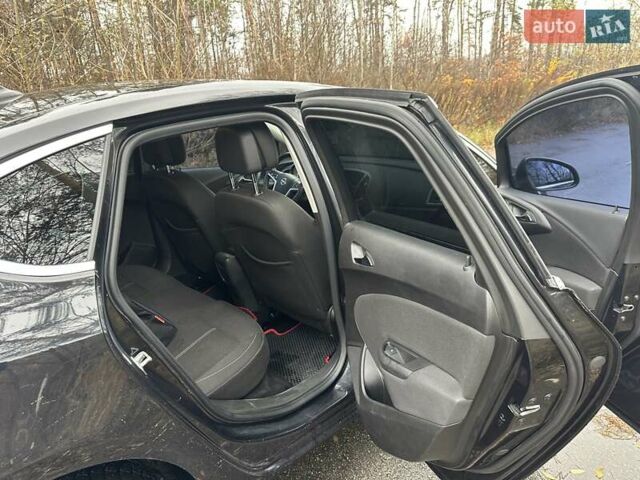 Черный Опель Астра, объемом двигателя 1.6 л и пробегом 150 тыс. км за 7777 $, фото 40 на Automoto.ua