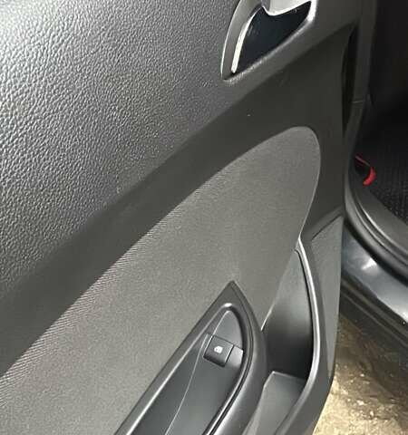 Черный Опель Астра, объемом двигателя 1.6 л и пробегом 150 тыс. км за 7777 $, фото 28 на Automoto.ua