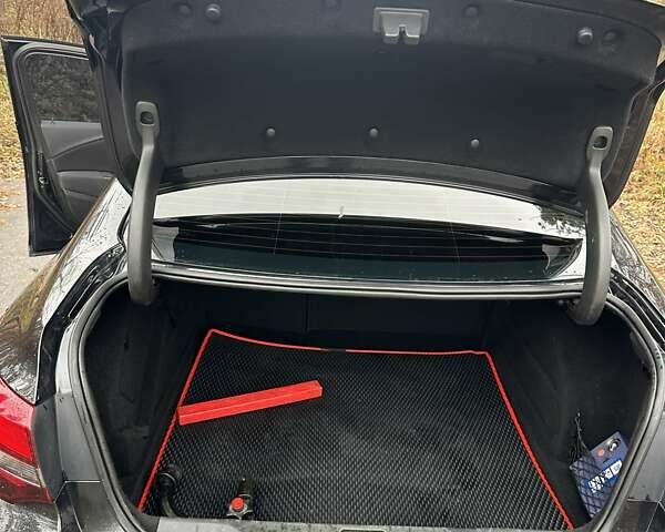 Черный Опель Астра, объемом двигателя 1.6 л и пробегом 150 тыс. км за 7777 $, фото 46 на Automoto.ua