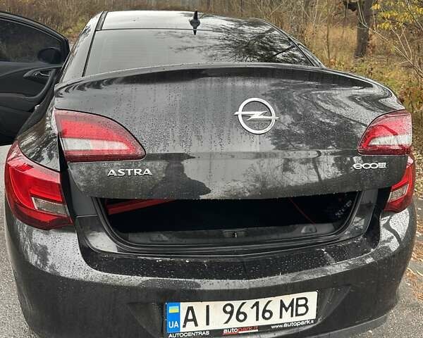 Черный Опель Астра, объемом двигателя 1.6 л и пробегом 150 тыс. км за 7777 $, фото 11 на Automoto.ua