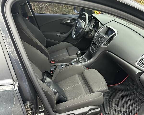 Черный Опель Астра, объемом двигателя 1.6 л и пробегом 150 тыс. км за 7777 $, фото 39 на Automoto.ua