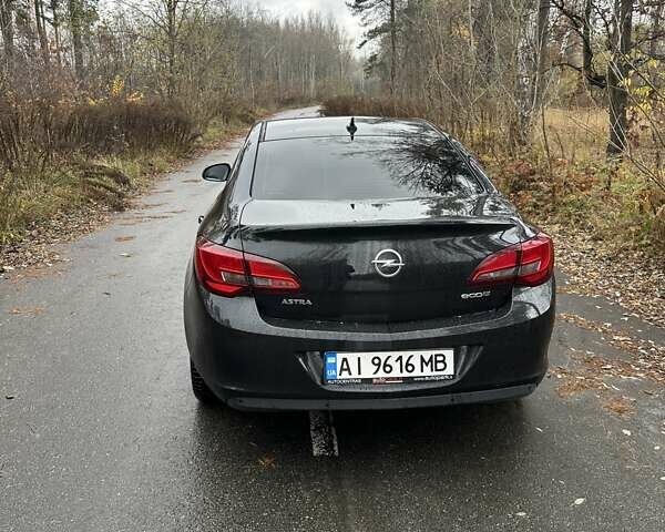 Черный Опель Астра, объемом двигателя 1.6 л и пробегом 150 тыс. км за 7777 $, фото 9 на Automoto.ua