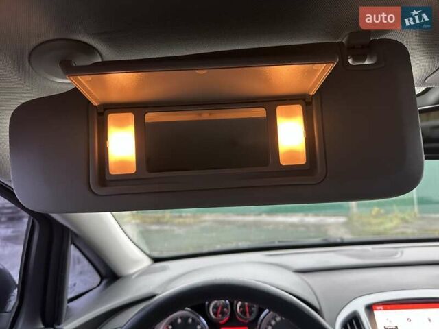 Черный Опель Астра, объемом двигателя 1.6 л и пробегом 150 тыс. км за 7777 $, фото 68 на Automoto.ua