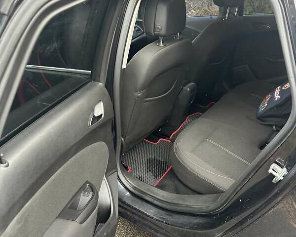 Черный Опель Астра, объемом двигателя 1.6 л и пробегом 150 тыс. км за 7777 $, фото 42 на Automoto.ua