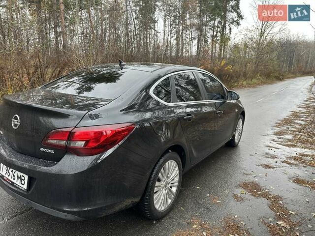 Черный Опель Астра, объемом двигателя 1.6 л и пробегом 150 тыс. км за 7777 $, фото 8 на Automoto.ua