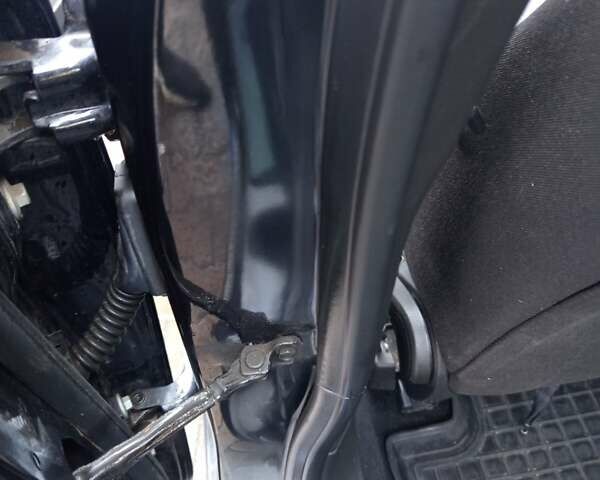 Черный Опель Астра, объемом двигателя 1.6 л и пробегом 253 тыс. км за 7999 $, фото 12 на Automoto.ua