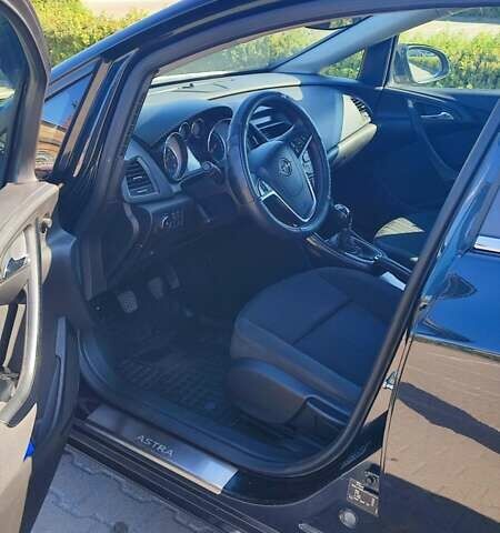 Черный Опель Астра, объемом двигателя 1.6 л и пробегом 253 тыс. км за 8500 $, фото 5 на Automoto.ua