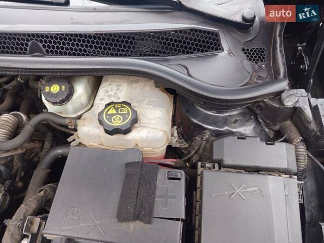 Черный Опель Астра, объемом двигателя 1.6 л и пробегом 253 тыс. км за 7999 $, фото 14 на Automoto.ua