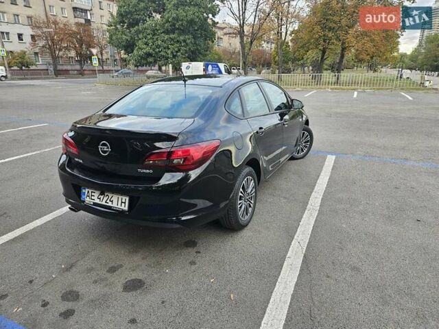 Черный Опель Астра, объемом двигателя 1.4 л и пробегом 70 тыс. км за 11500 $, фото 35 на Automoto.ua