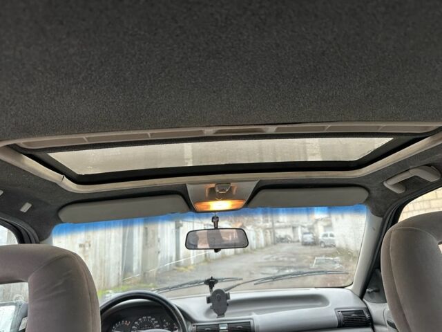 Черный Опель Астра, объемом двигателя 1.8 л и пробегом 100 тыс. км за 1250 $, фото 10 на Automoto.ua