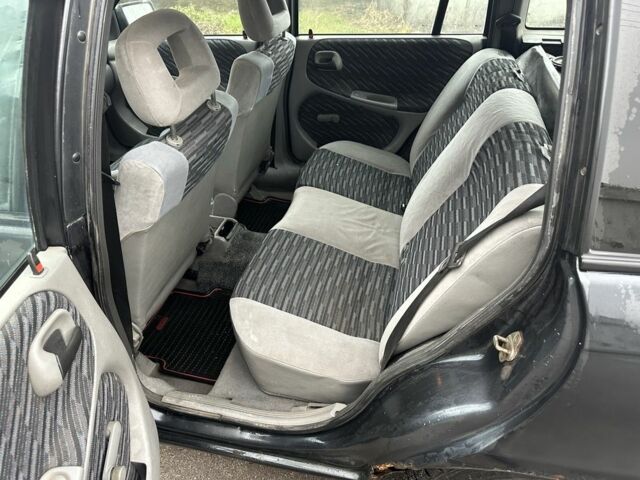 Черный Опель Астра, объемом двигателя 1.8 л и пробегом 100 тыс. км за 1250 $, фото 9 на Automoto.ua