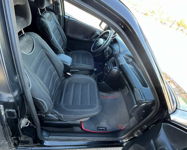 Черный Опель Астра, объемом двигателя 1.7 л и пробегом 590 тыс. км за 2400 $, фото 10 на Automoto.ua