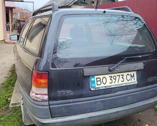 Черный Опель Астра, объемом двигателя 1.39 л и пробегом 325 тыс. км за 1150 $, фото 2 на Automoto.ua