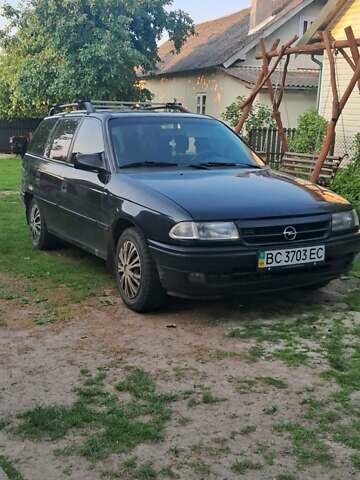 Черный Опель Астра, объемом двигателя 1.6 л и пробегом 270 тыс. км за 1750 $, фото 1 на Automoto.ua